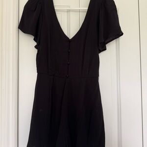 Elegant Black Romper with Button Detail